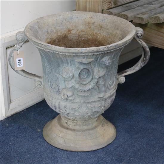 A pair of lead garden urns W.approx. 55cm